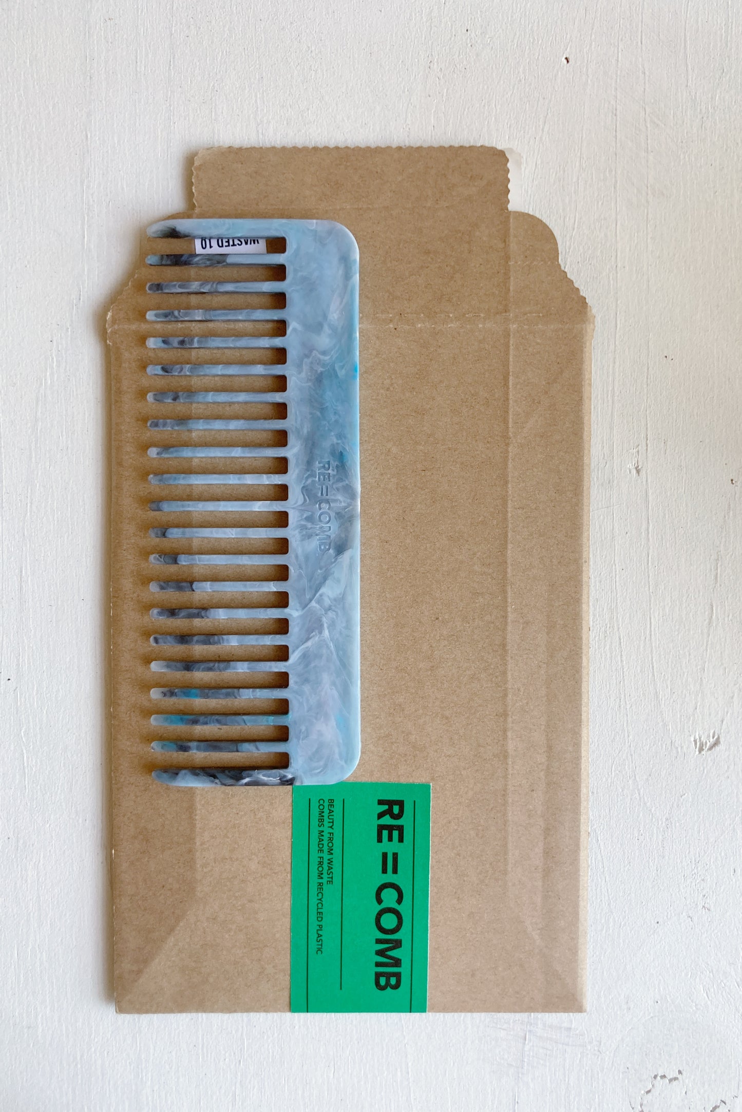 RE = COMB / ヘアコーム